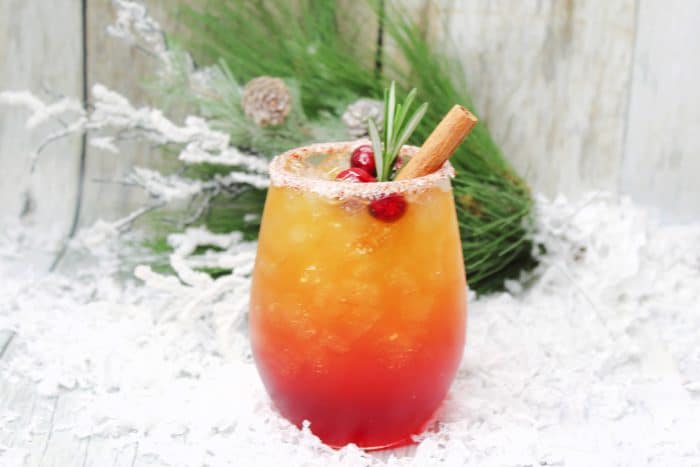 naughty and nice cocktail on a winter backdrop