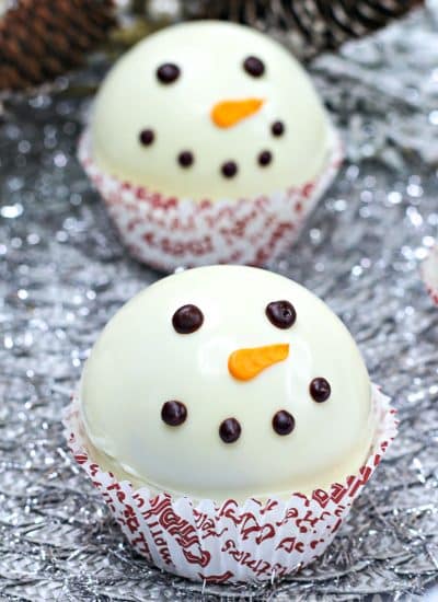 Snowman Hot Chocolate Bombs on silver platter