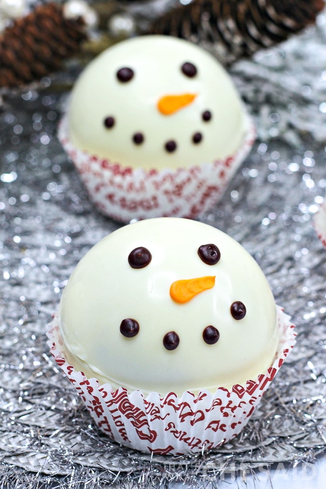 Snowman Hot Chocolate Bombs on silver platter