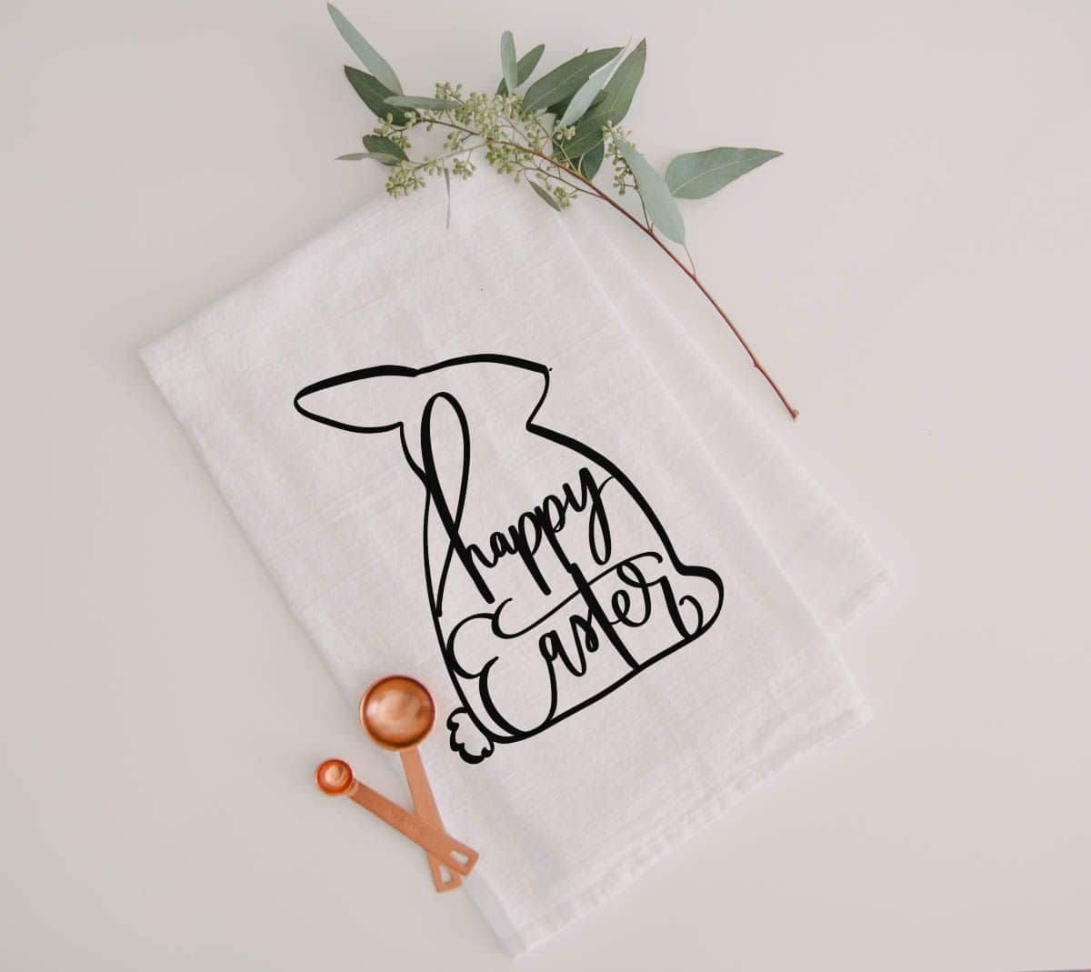 tea towel with hand drawn bunny and the words happy easter