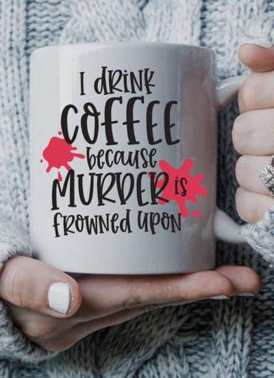 Woman in sweater holding coffee mug with murder svg