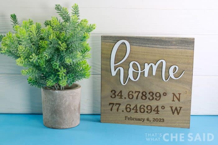 Home coordinates sign made with xtool P2 CO2 laser. engraved and cut
