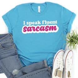 Blue shirt with "I speak fluent sarcasm" in two colors of iron on
