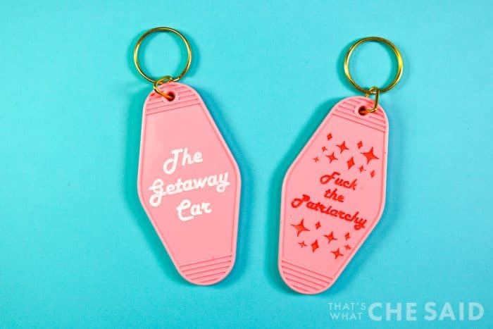 Acrylic hotel keychains engraved wtih Taylor swift sayings and filled with paint.  