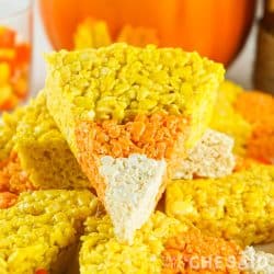 Candy Corn Rice Krispie Treat slice on a stack of slices