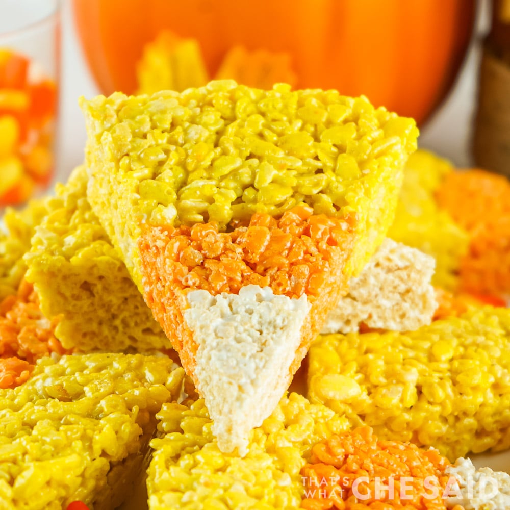Candy Corn Rice Krispie Treat slice on a stack of slices