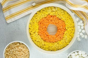 9 inch pan with yellow outer ring and orange center ring