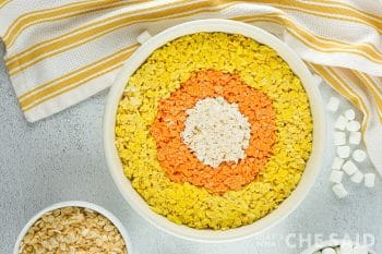 9 inch pan with yellow outer ring and orange center ring and white center