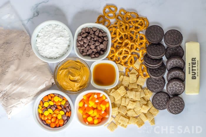 Fall Puppy Chow Ingredients on white marble table top