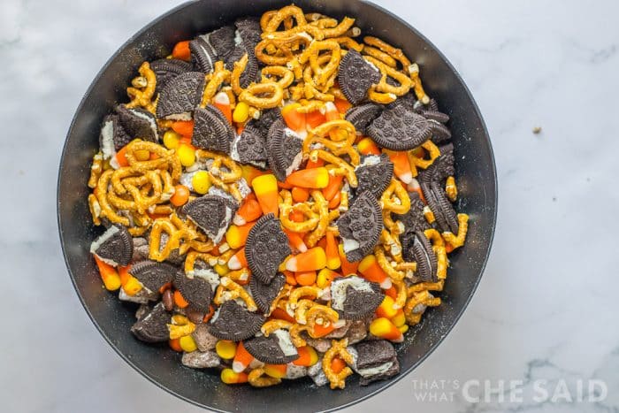 Oreos, pretzels and candy corns added to mixture