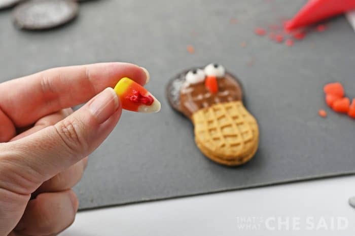 icing added to candy corn to add to turkey cookie