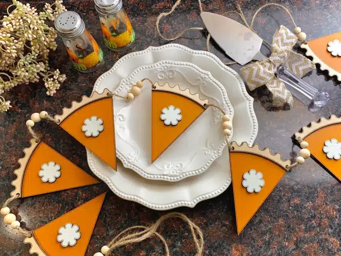 Wooden Pumpkin Pie Garland over a place setting