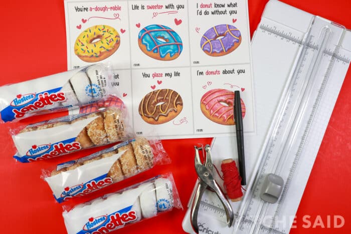 donut valentine supplies - free printable, paper trimmer, pen, twine, hole punch, donut packs