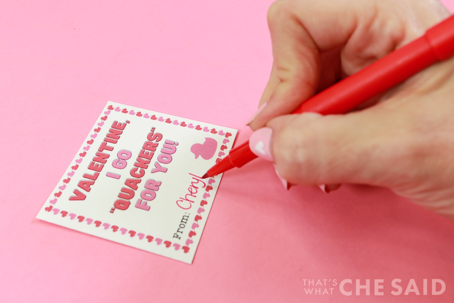 Signing the valentine cards