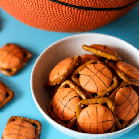 bowl of basketball pretzel bites in in front of a basketball