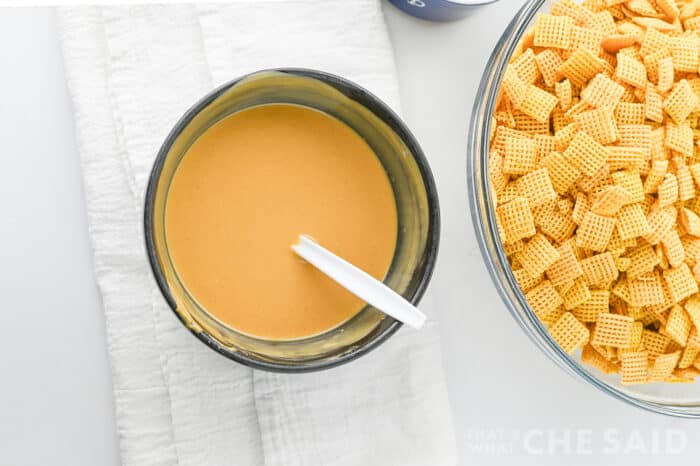 Melted peanut butter and white chocolate chip mixture bowl.