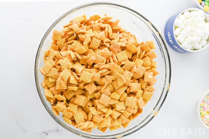 Chocolate peanut butter mixture on chex cereal in bowl
