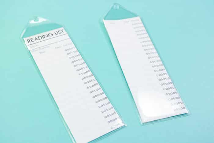 Close up of cut bookmarks inserted into plastic sleeves