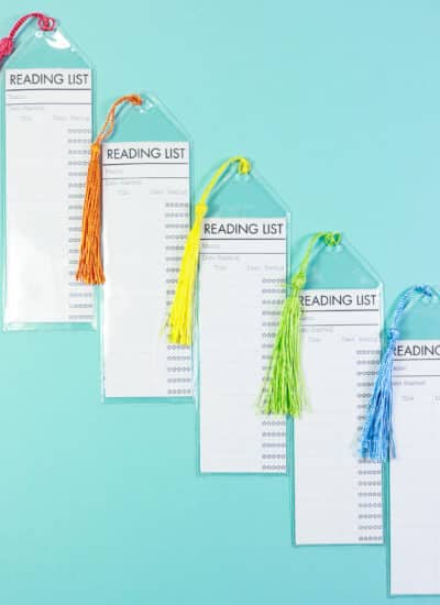 Square Reading List Bookmarks with rainbow tassels lined up