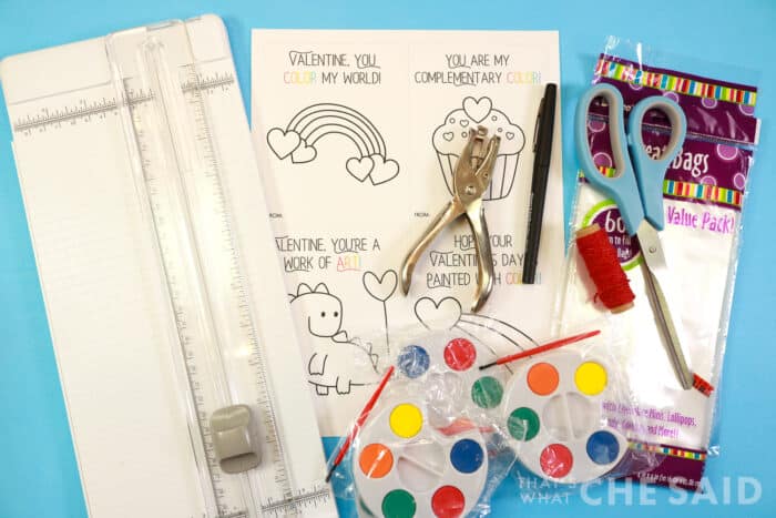 Supplies for Paint Palette Valentines on blue background