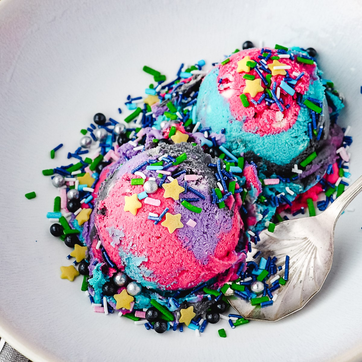 Galaxy ice cream in a bowl with sprinkles