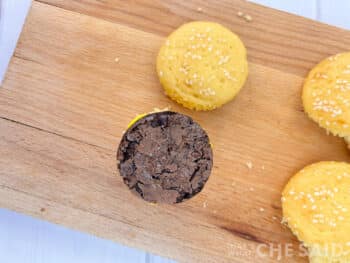 Adding Burger Brownie Pattie on top of mustard icing