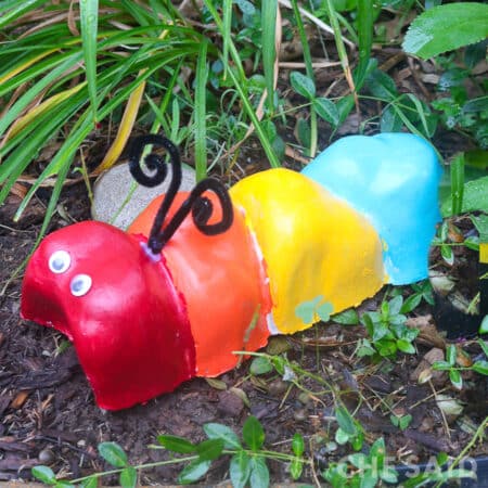 Edging Garden stone craft paintined lke caterpillar in grass square format