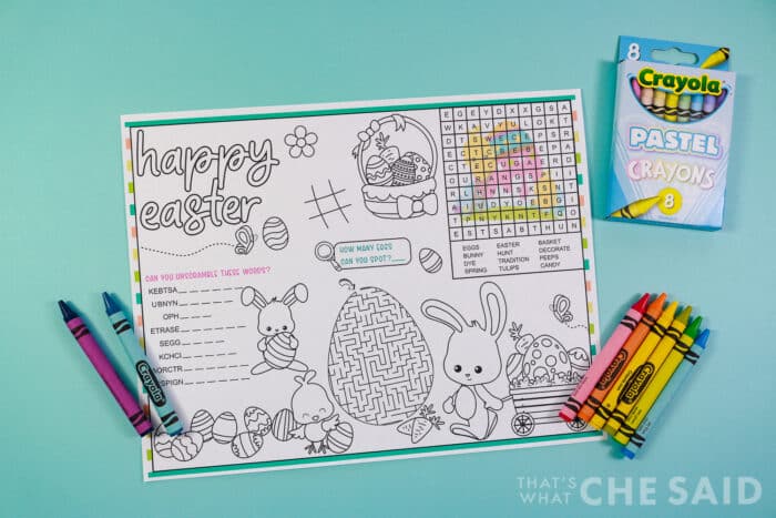 Horizontal free printable easter placemat with crayons on aqua background