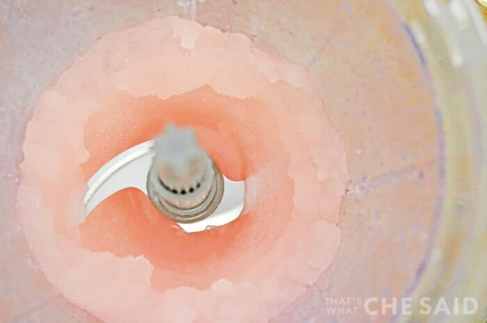 Blended frozen pink lemonade margaritas in blender