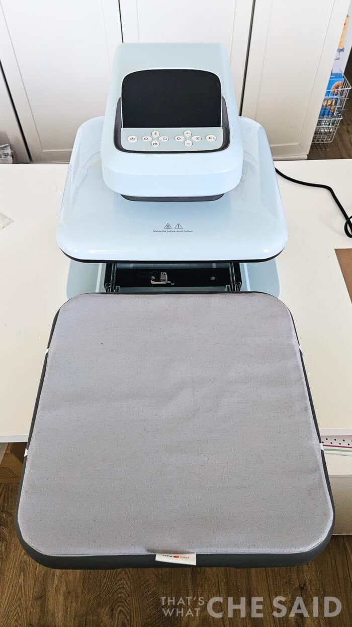 The HTVRont Auto Heat Press 2 with the material tray fully extended outward