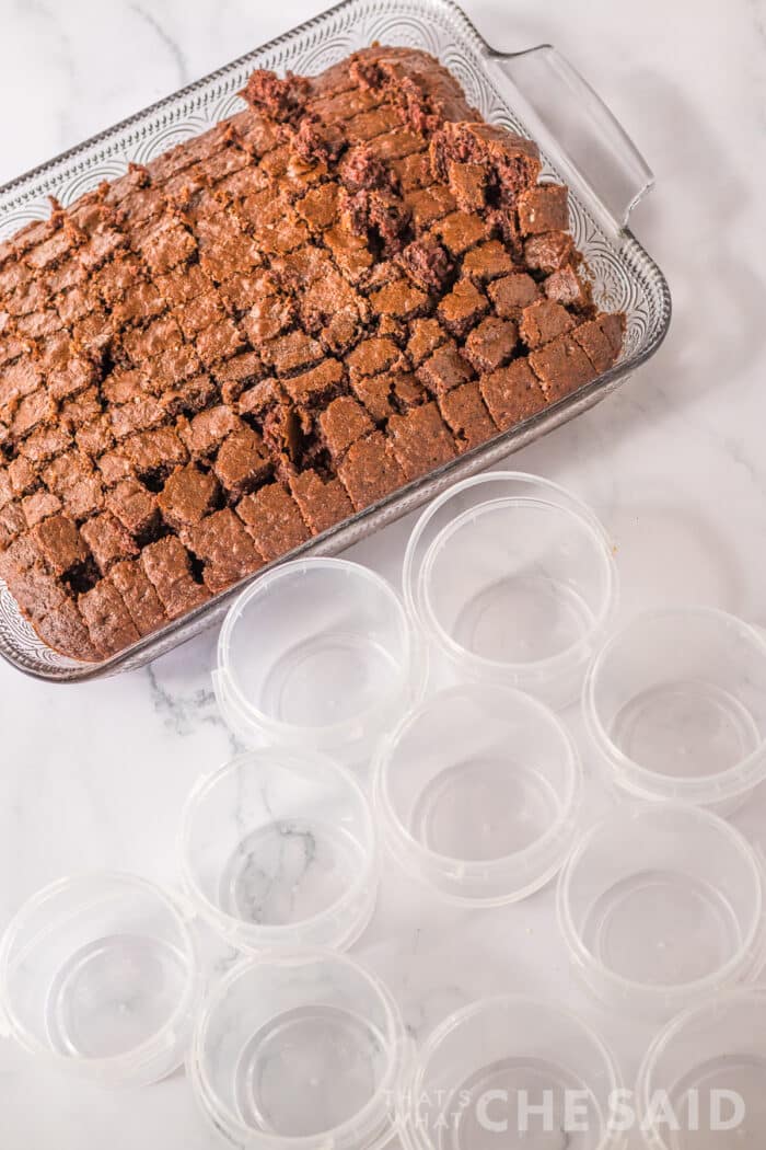 filling buckets with cake