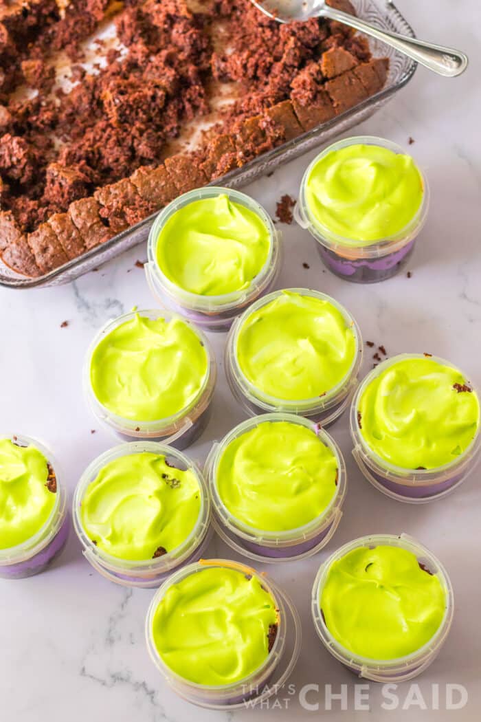 adding green frosting