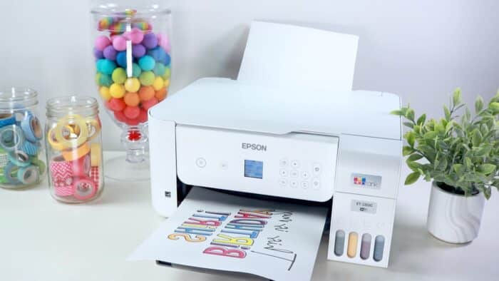 converted epson sublimation printer printing a sublimation design on sublimation paper using sublimation ink