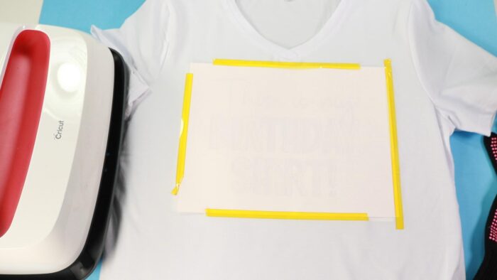 SUblimation design taped face down onto a sublimatoin shirt and secured with heat resistant tape