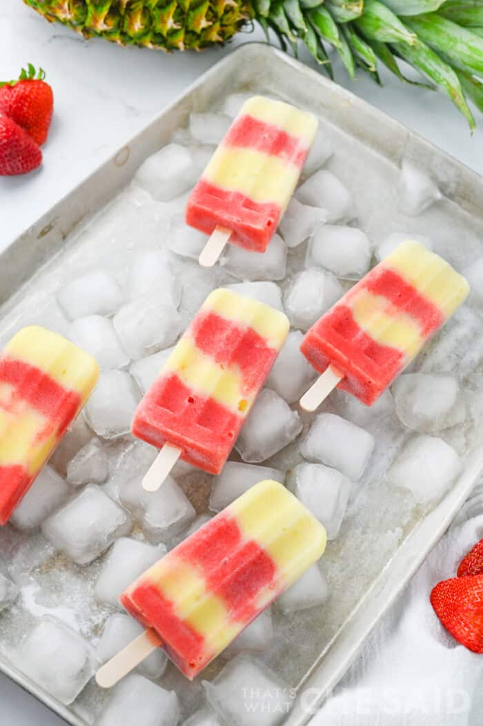 Lava flow popsicles on a baking sheet of ice