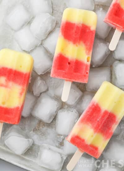 Lava flow popsicles on a tray of ice in square format