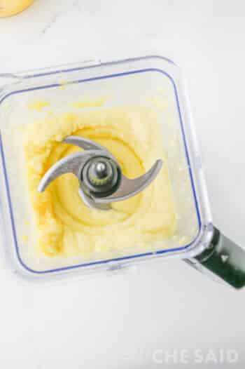 Blender with blended pineapple
