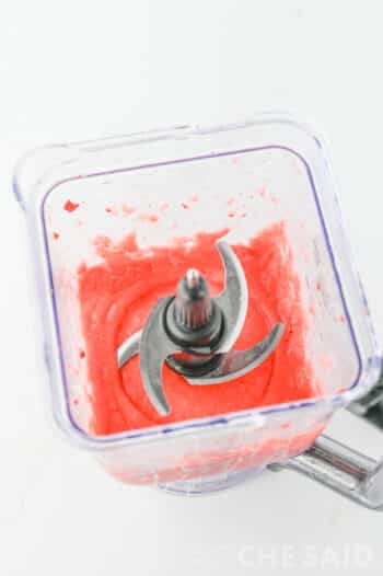Frozen strawberries blended in the blender