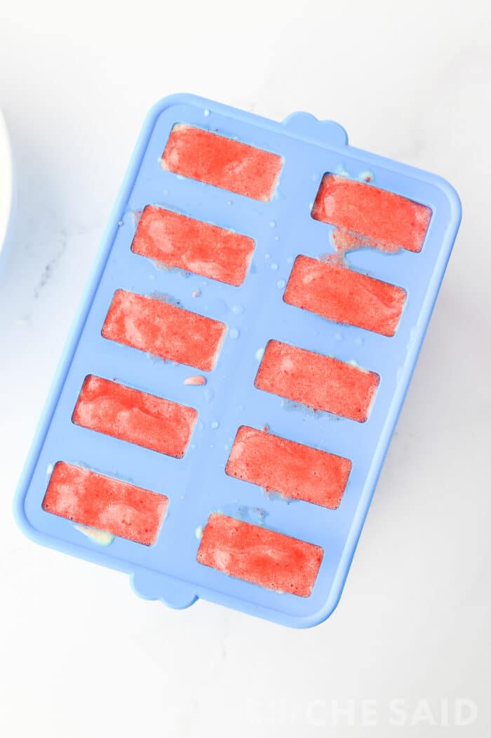Popsicle mold filled to top