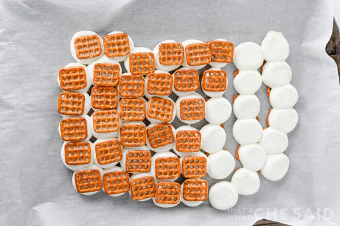 Roasted marshmallows inside 2 square pretzels